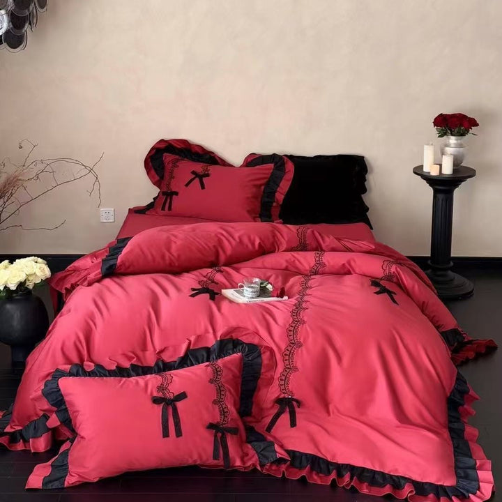 Luxurious satin bedding set with ruffles, lace embroidery and decorative bows