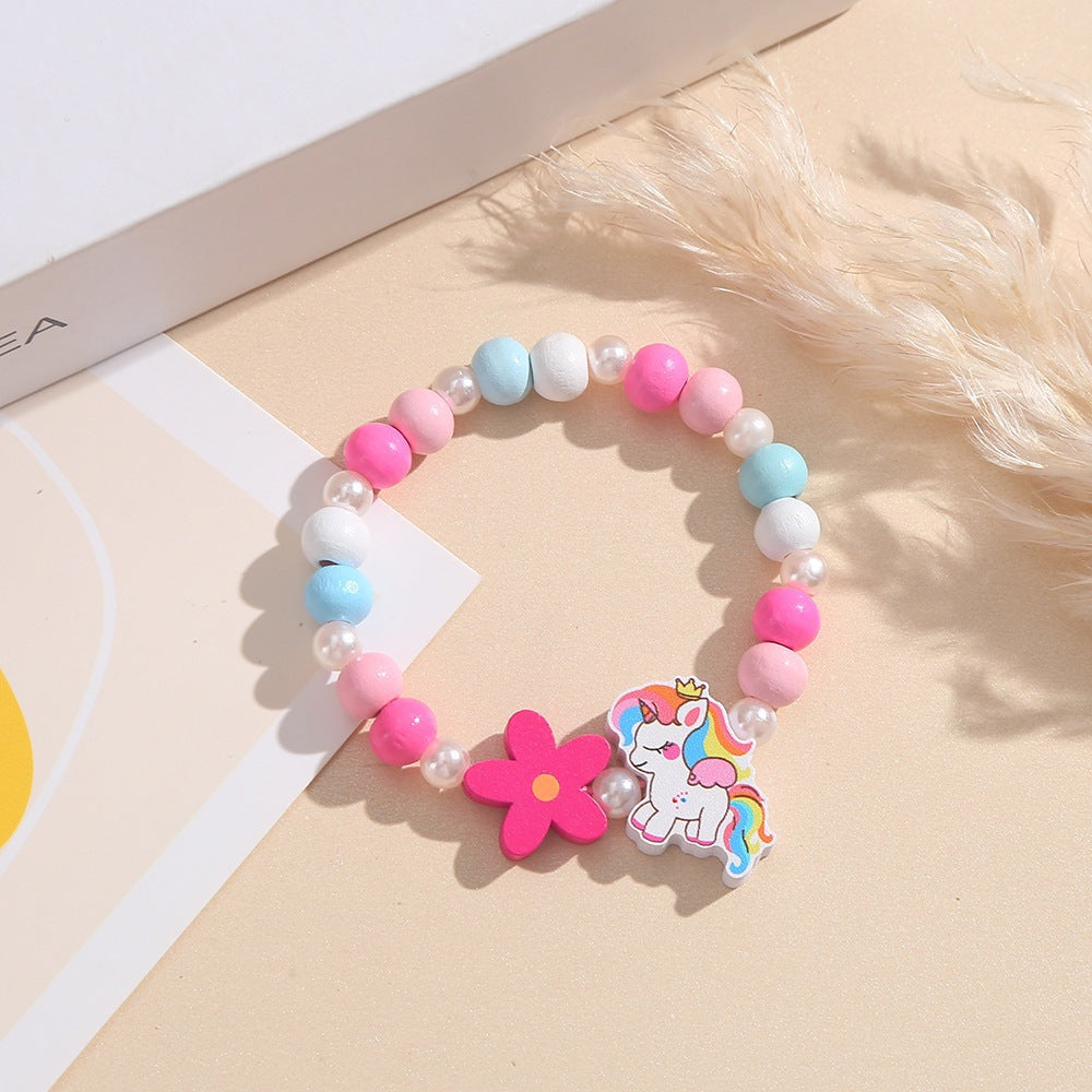 Playful children's bracelet with unicorn and flower motif Stornfield