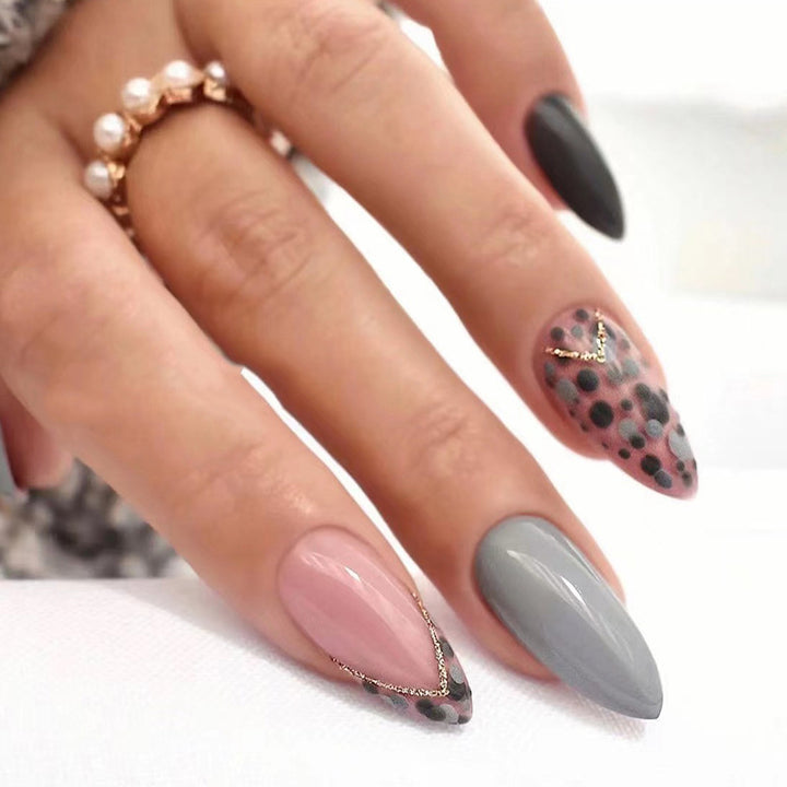 Artful stiletto nails with elegant accent design Stornfield
