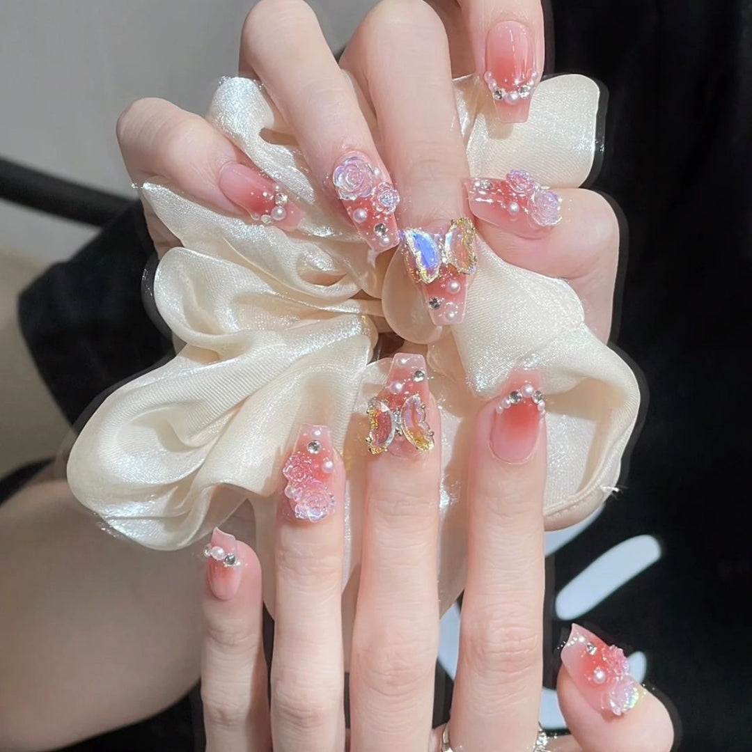 Artificial artificial nails with heart design and glitter details Stornfield