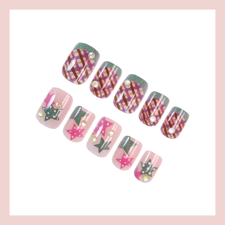 Artificial nail set with playful geometric designs and glitter accents Stornfield
