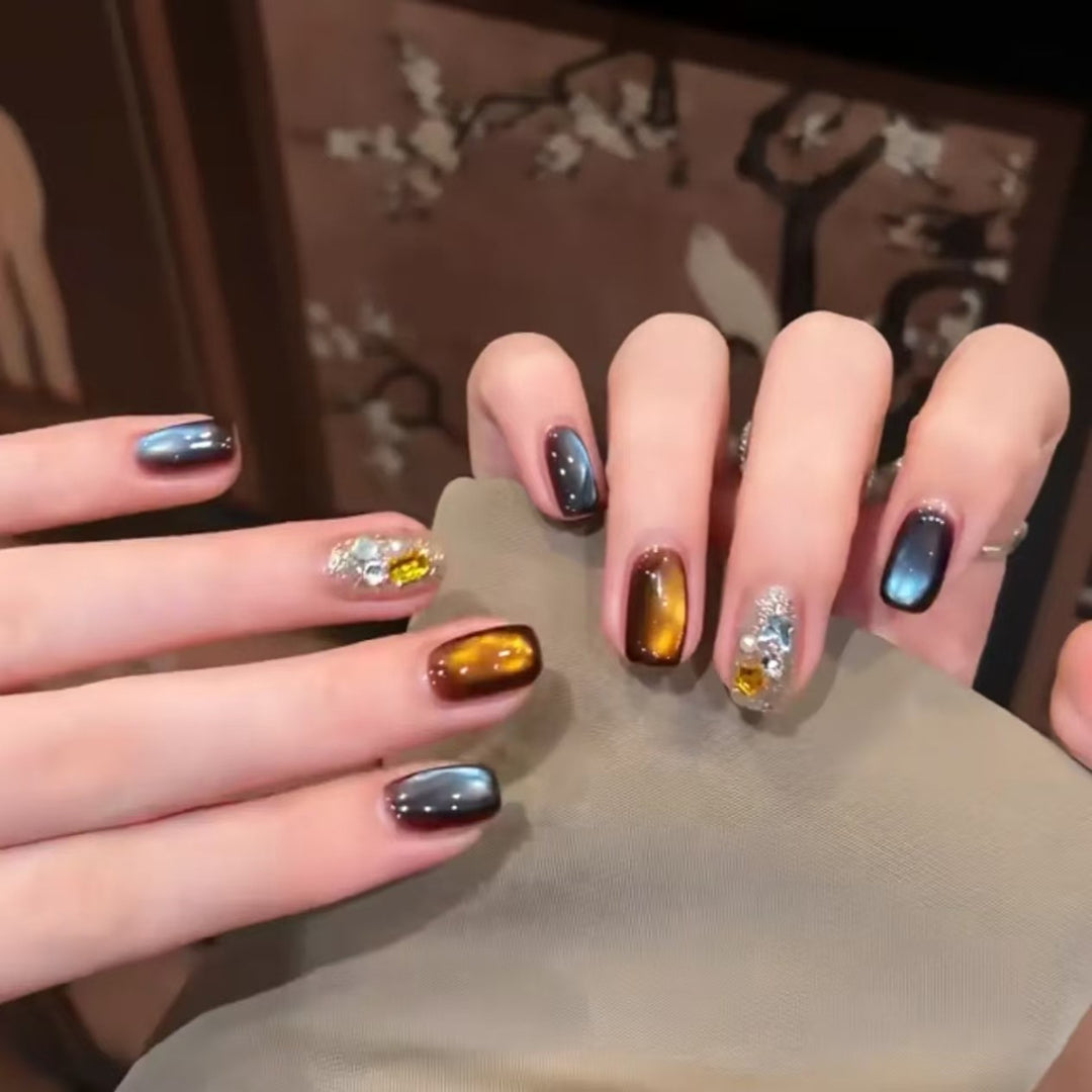 Artistic Ombre Nail Extensions with Metallic Accents