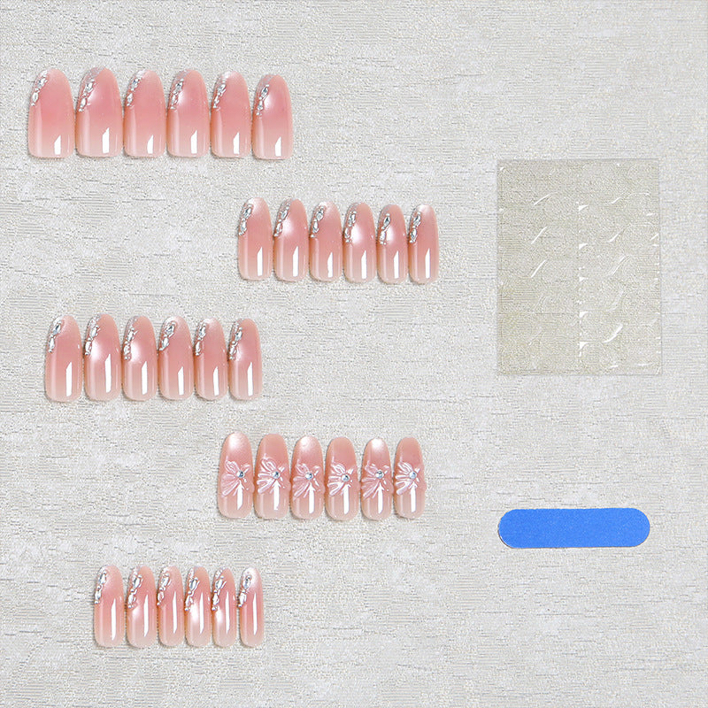 Acrylic nail set with elegant ombre design and sparkling accents Stornfield