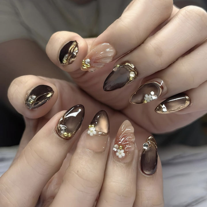 Artful nail extensions with elegant 3D flower embellishments Stornfield