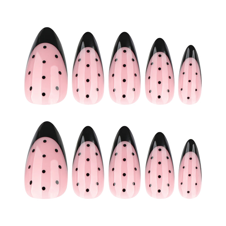 Artistic stiletto nails with black dot pattern Stornfield