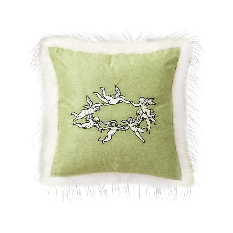 Luxurious decorative velvet cushion with angel embroidery and faux fur trim