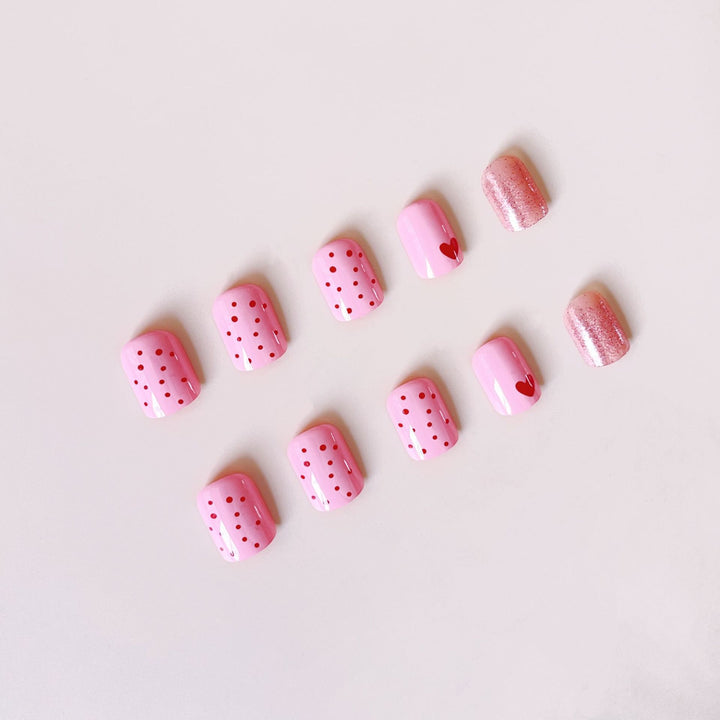 Artificial nail set with romantic heart motifs and sparkling accents Stornfield