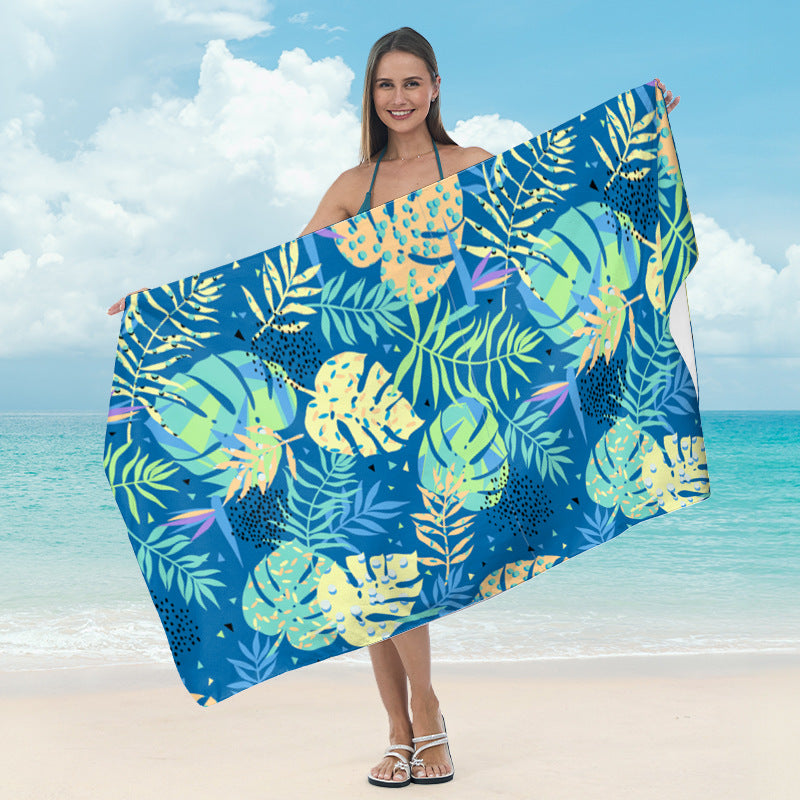 Large beach towel with tropical palm pattern Stornfield