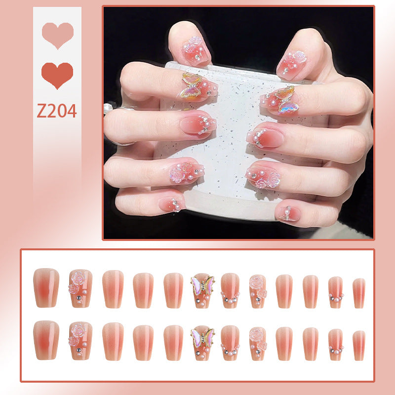 Artificial nail set with filigree 3D flowers and radiant glitter accents Stornfield