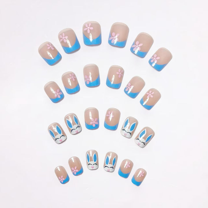 Creative nail art with cheerful bunny and flower pattern Stornfield