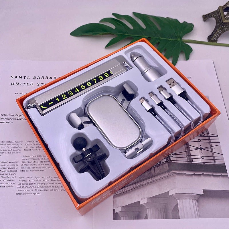 Unisex cordless car charging holder with integrated phone holder Stornfiled