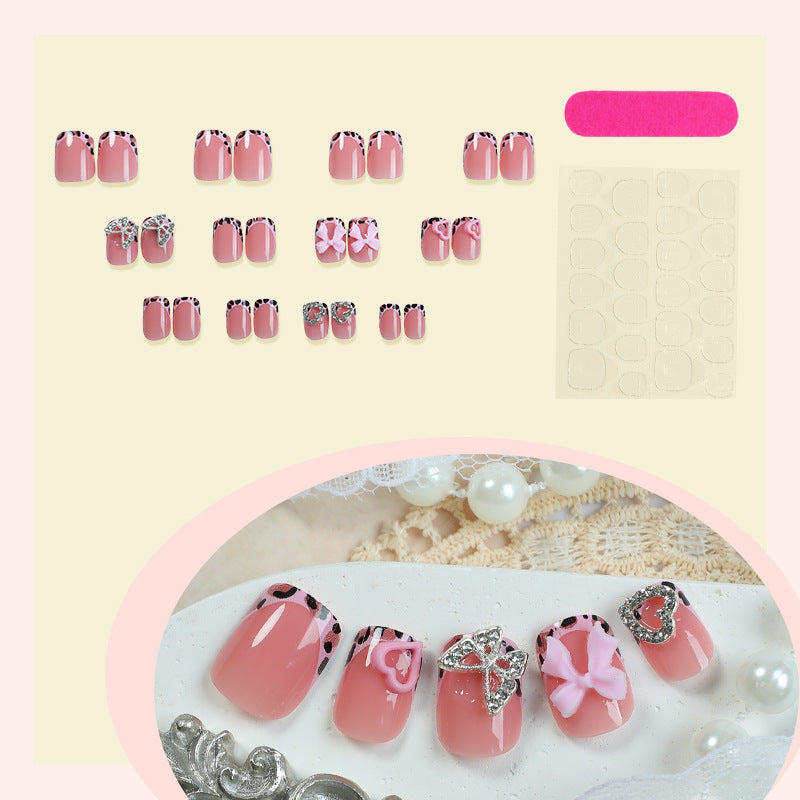 Decorative Press-On Nail Set with Artistic Bow and Heart Accents Stornfield