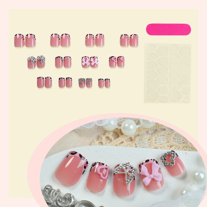 Decorative Press-On Nail Set with Artistic Bow and Heart Accents Stornfield