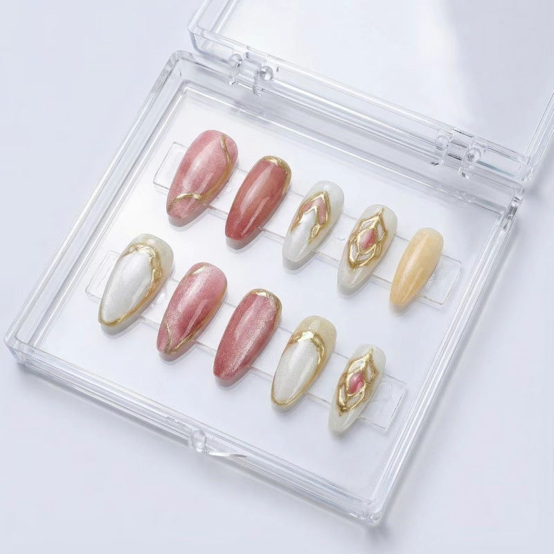 Artificial nails with floral gold accents and glossy finish Stornfield