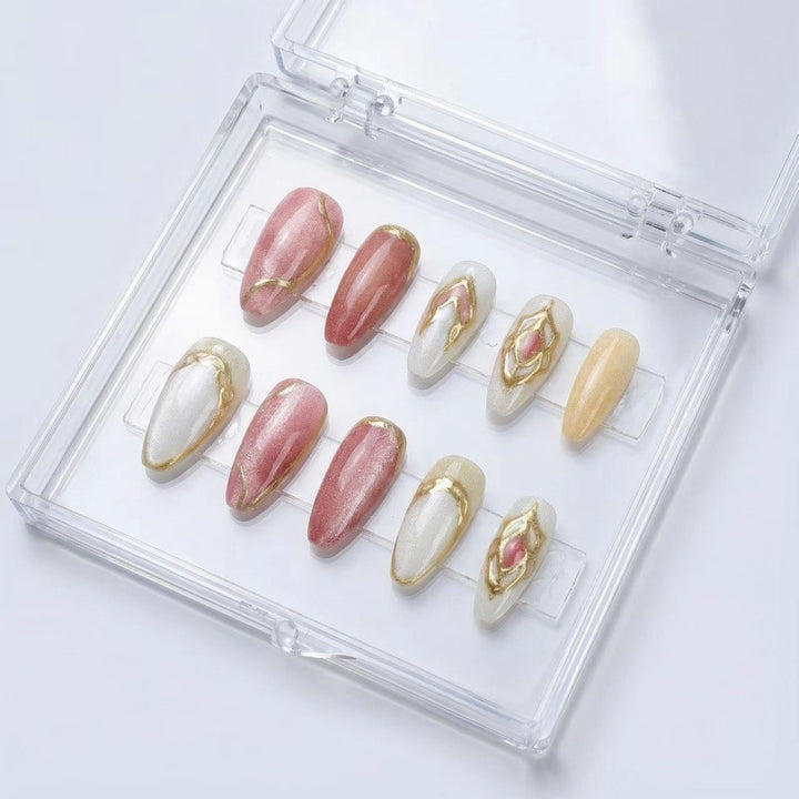 Artificial nails with floral gold accents and glossy finish Stornfield