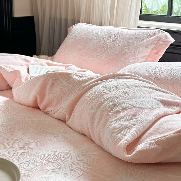 Quilted bed linen set made of fine cotton satin with embossed leaf quilting and hotel closure