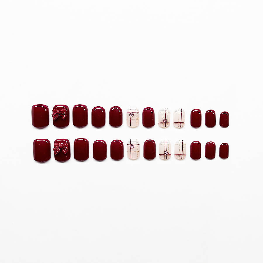 Decorative Press-On Nail Art Extensions with Bow Accents Stornfield