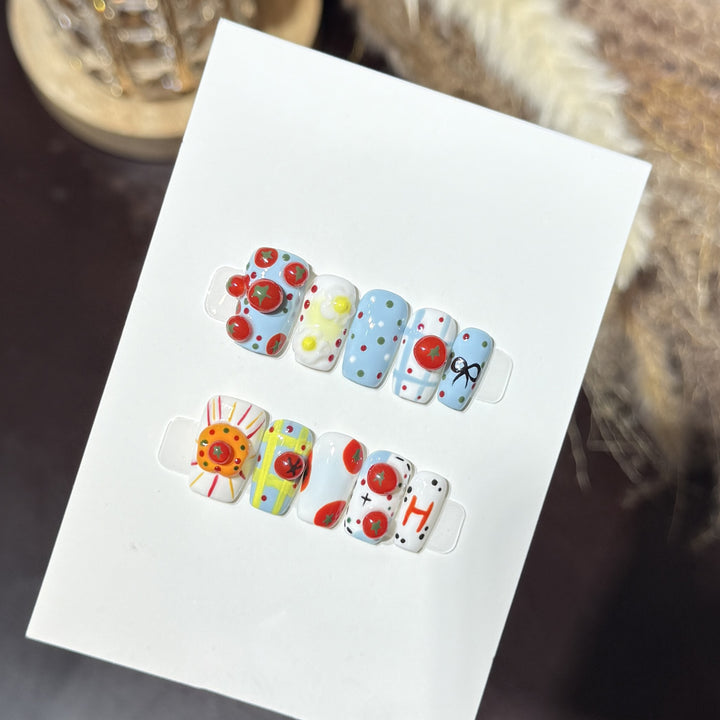 Artistic Press-On Nail Set with Playful Floral and Polka Dot Designs Stornfield