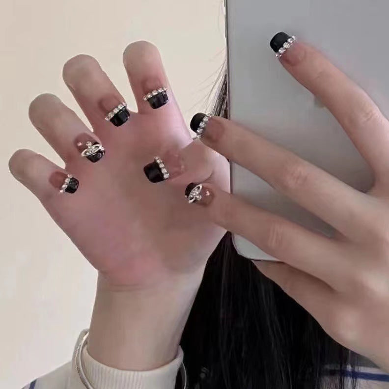 Glamorous nail art with rhinestone embellishments Stornfield