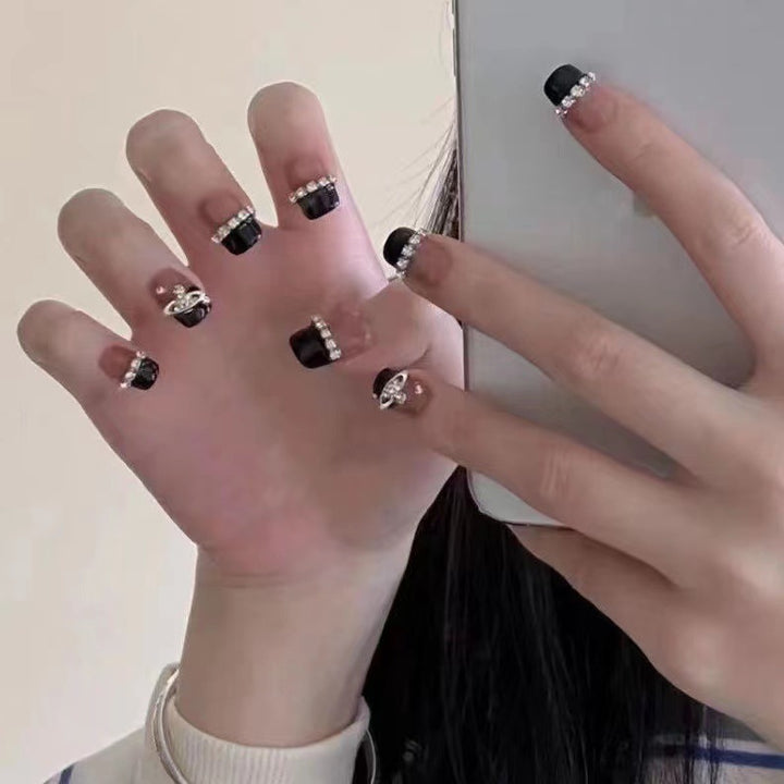 Glamorous nail art with rhinestone embellishments Stornfield