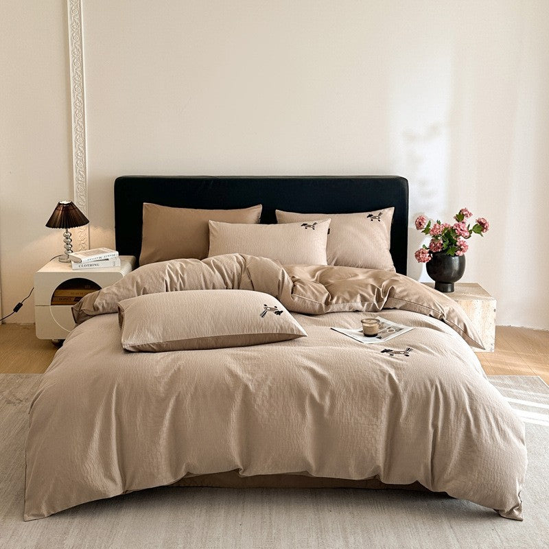 Bedding set in linen look with delicate flower embroidery