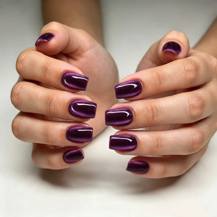 Artificial nails with glossy metallic finish and striking ombre effects Stornfield