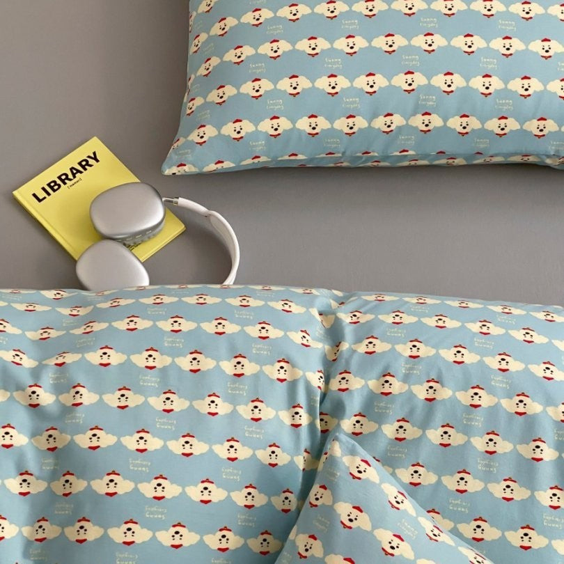 Light cotton bedding set with quilted topper and fine stripe pattern