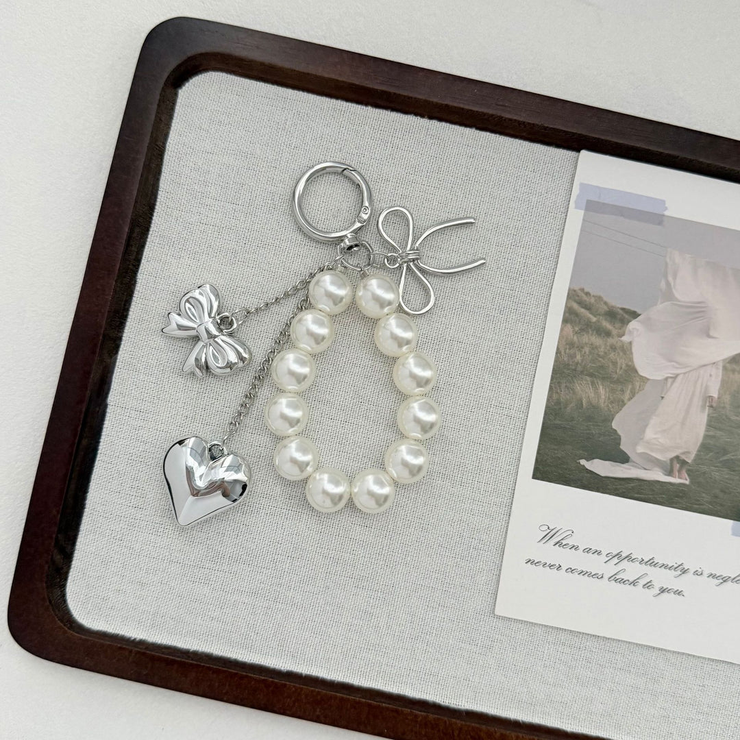 Elegant Heart and Bow Charm Keychain Stornfield
