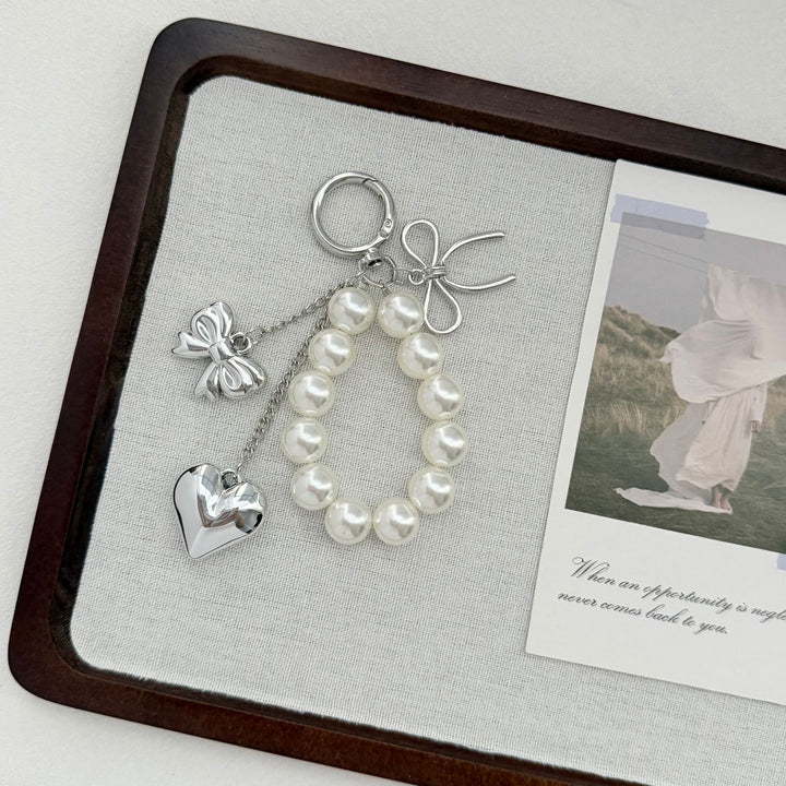 Elegant Heart and Bow Charm Keychain Stornfield