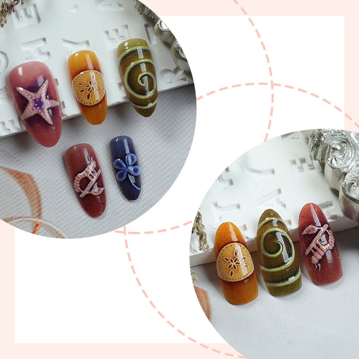 Artificial nail set with creative maritime and nature-inspired motifs Stornfield