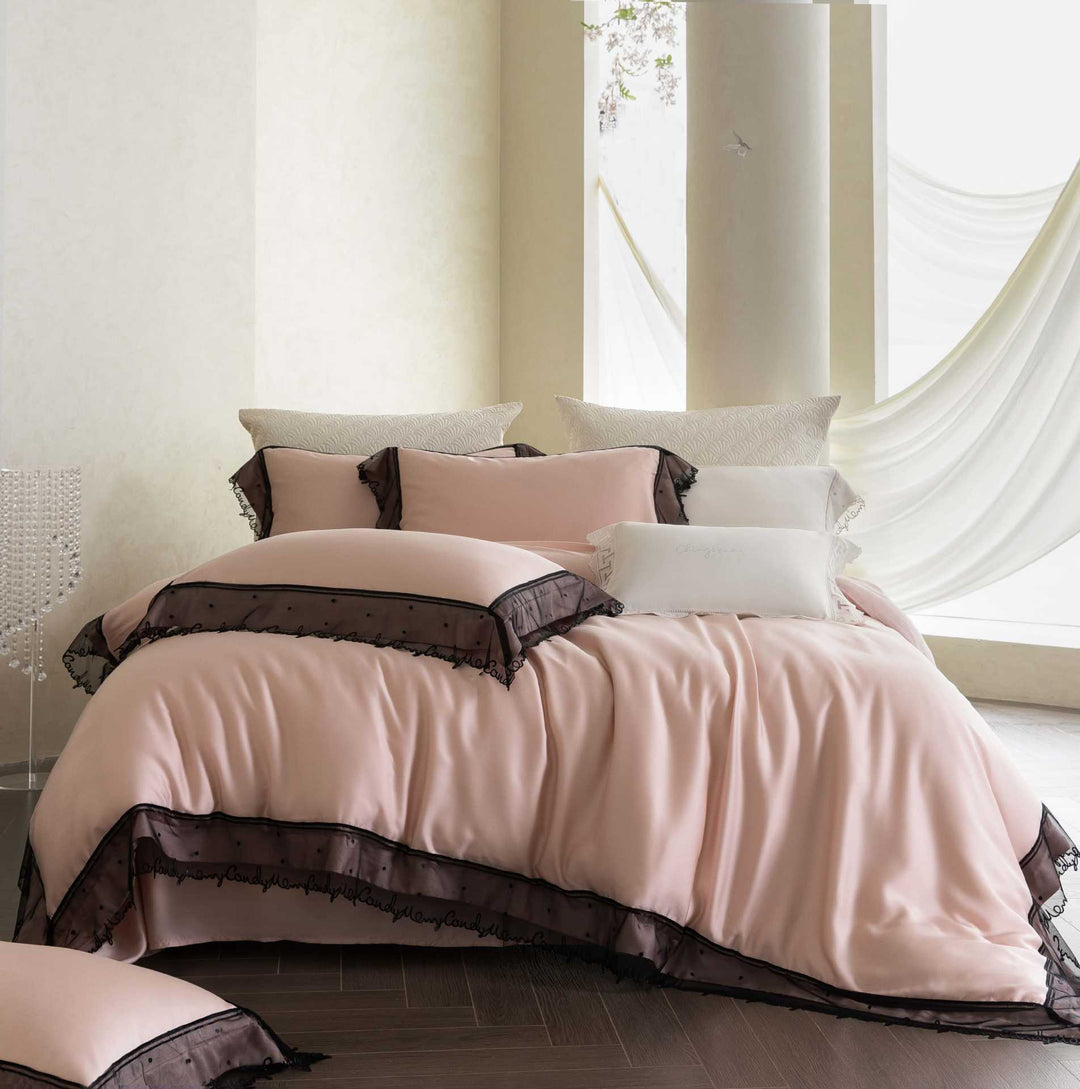 Satin bed linen set with delicate organza ruffle and lace trim