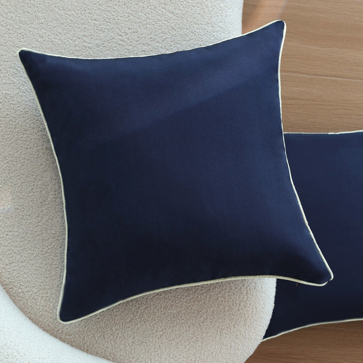 Square cushion cover with contrasting piping and microvelours surface Stornfield