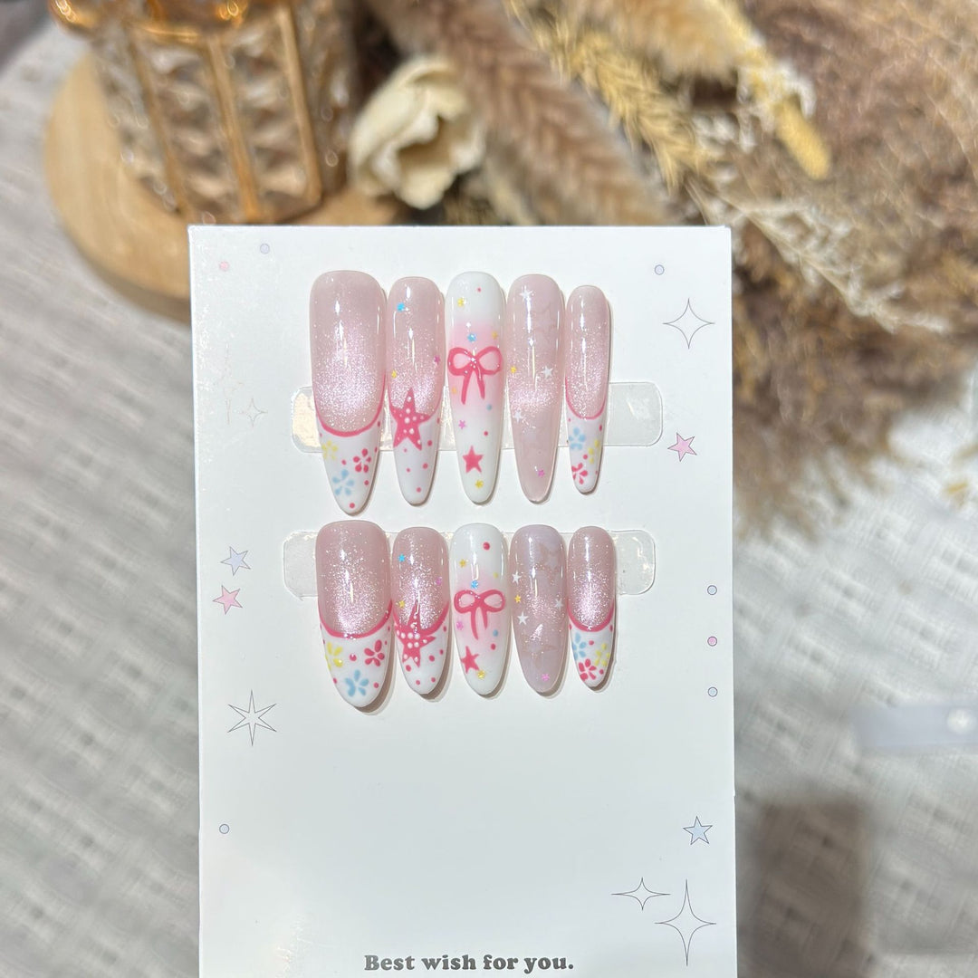 Artistic Press-On Nail Art Set with Charming Star and Bow Designs Stornfield