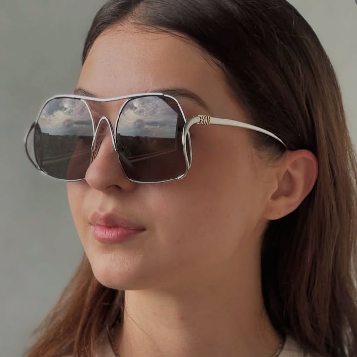 Women's geometric sunglasses with narrow metal frame and brown lenses Stornfield