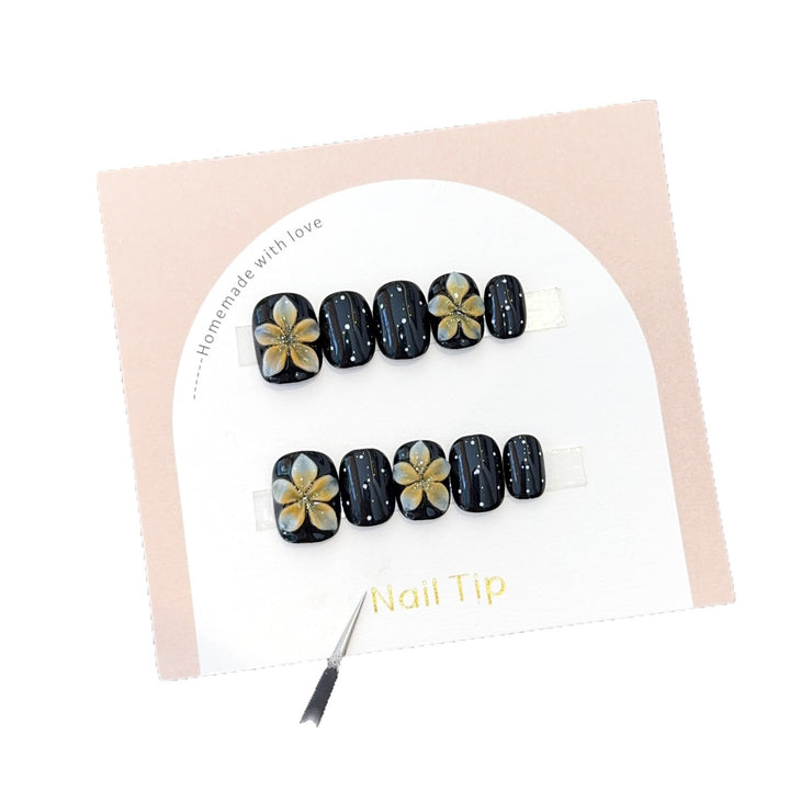 Artificial nails with floral accents and elegant shine Stornfield