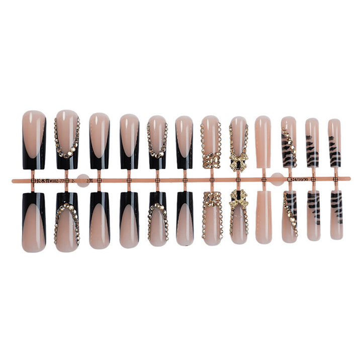 Acrylic nail set with glamorous 3D bows and radiant rhinestone decorations Stornfield