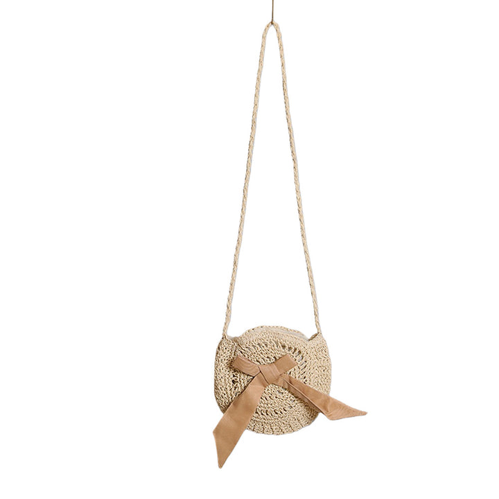 Handwoven shoulder bag with decorative bow accent Stornfield
