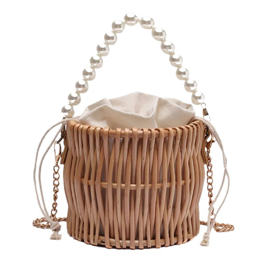 Women’s handbag with elegant pearl handle and braided design Stornfield