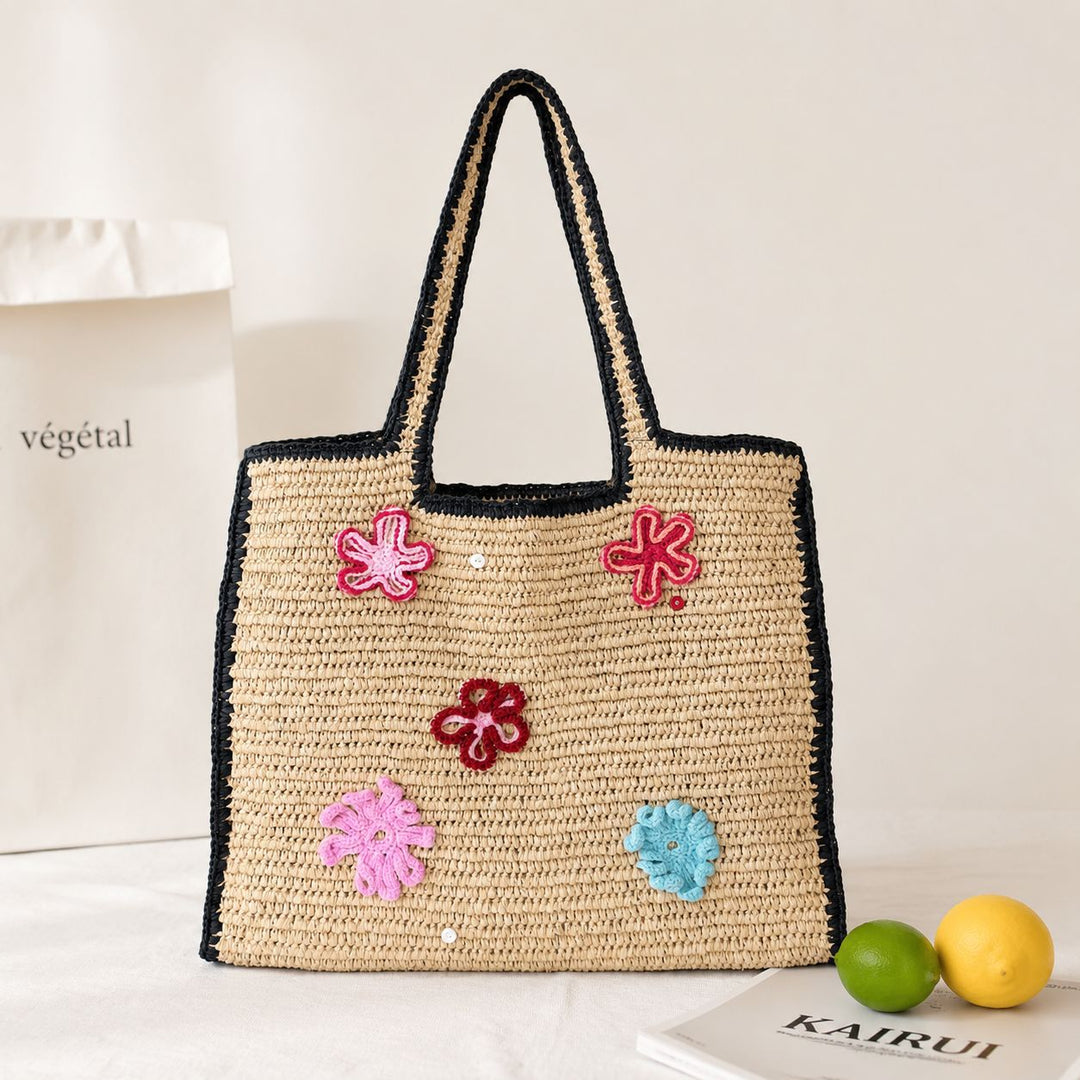 Handmade straw bag with flower appliqués Stornfield