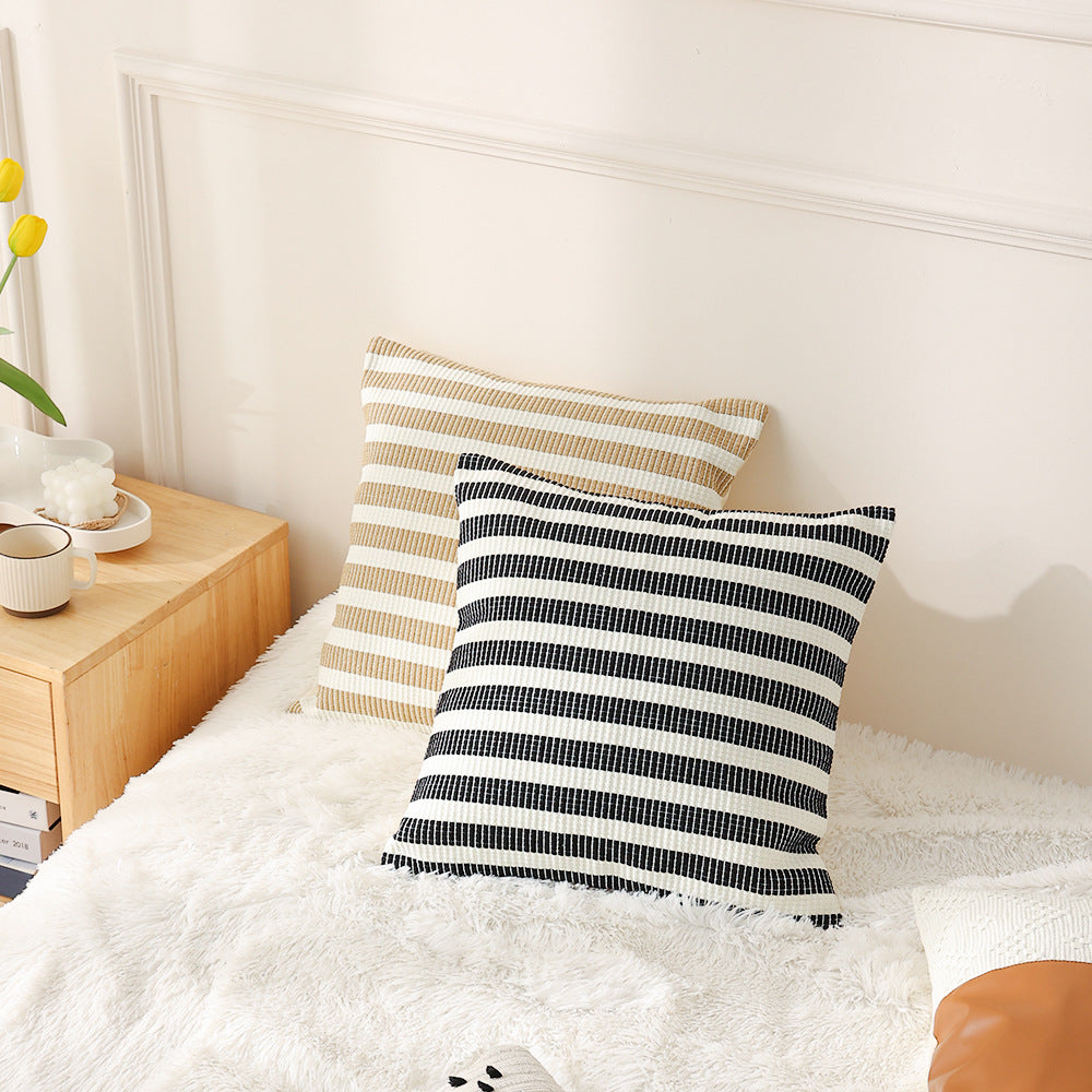 Woven square decorative cushion with fine ribbed texture and stripe pattern