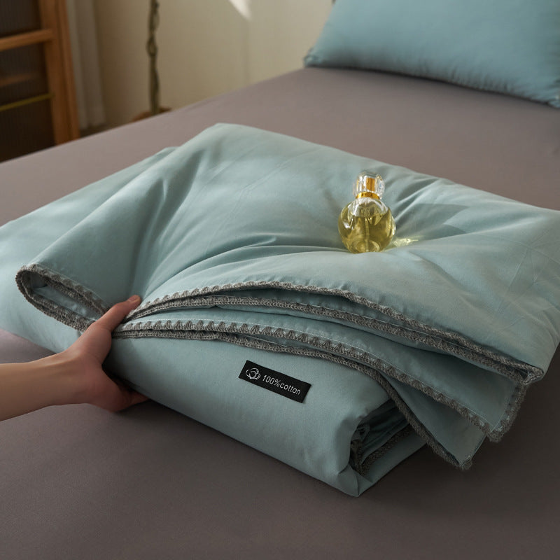 All-season quilted comforter made of pure cotton with a fine trim