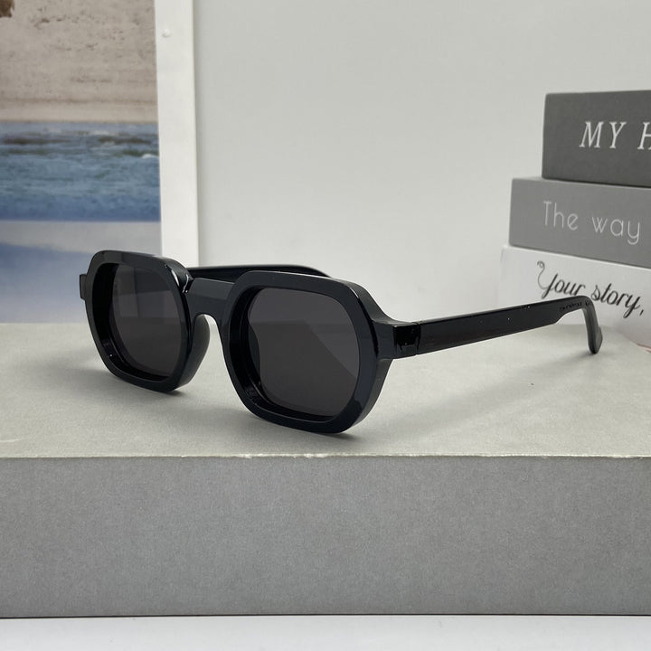 Women’s fashionable sunglasses in modern design with wide frame Stornfield