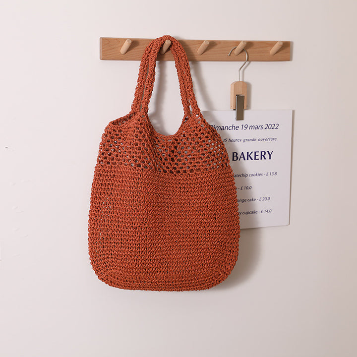 Handcrafted straw bag with wide carrying handle Stornfield
