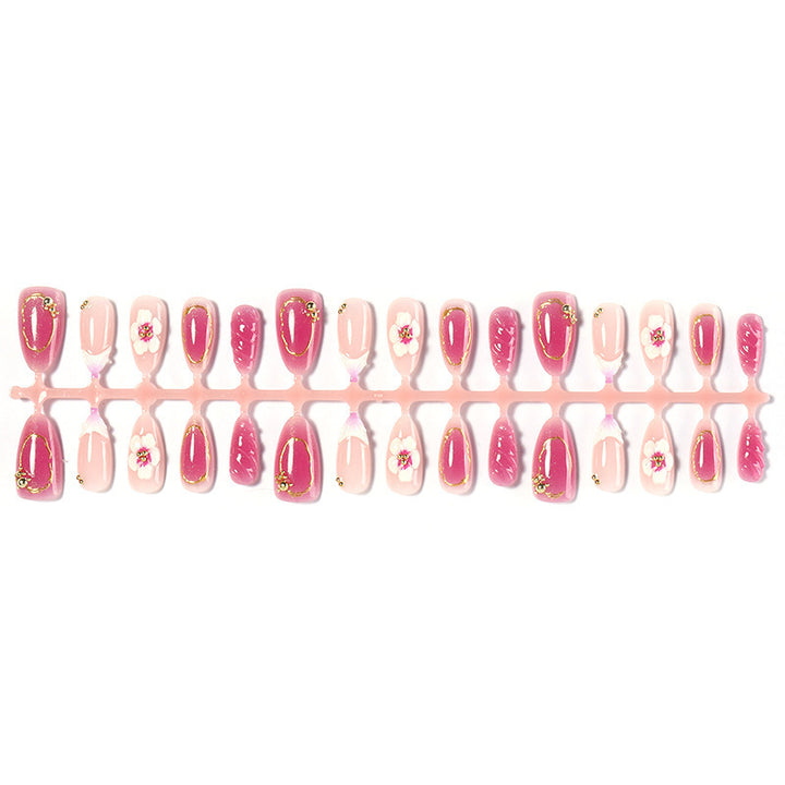 Creative acrylic nail set with floral accents and glitter decorations Stornfield