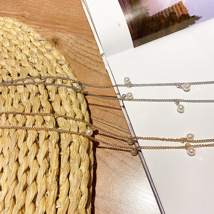 Fashionable glasses holder chain with pearl pendants Stornfield