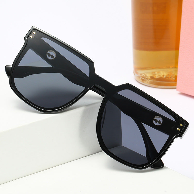 Women striking sunglasses with a distinctive geometric frame Stornfield