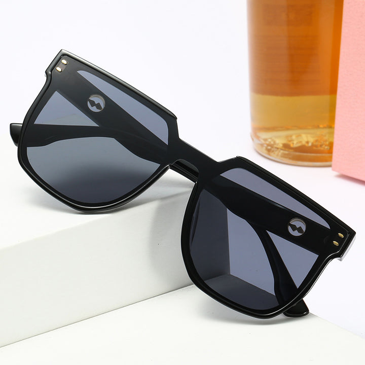 Women striking sunglasses with a distinctive geometric frame Stornfield