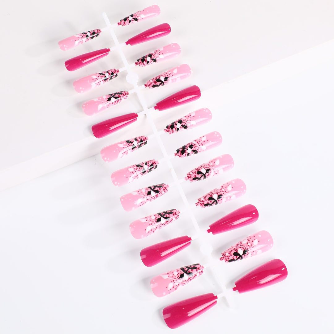 Artificial nails with floral and glittering accent Stornfield