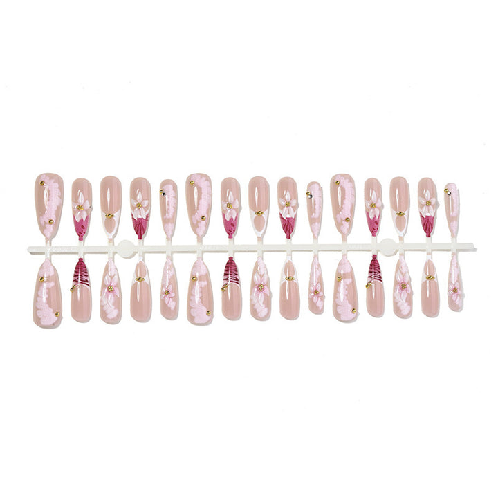 Artificial nail set with floral and elegant design elements Stornfield
