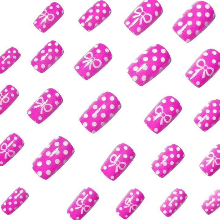 Artificial nails with romantic polka dot pattern and bow Stornfield